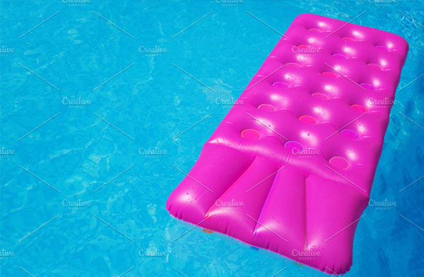 Pink Air Mattress in Swimming Pool Mockup